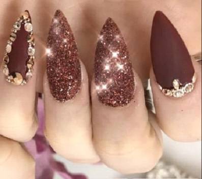 burgundy nail design with rhinestone