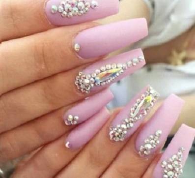Pink nail design with rhinestones